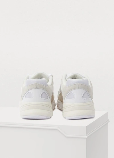 Shop Adidas Originals Yung-1 Sneakers In White