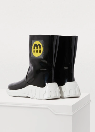 Shop Miu Miu Patent Rain Boots In Black