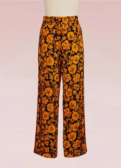 Shop Kenzo Silk Jogging Pants In Yellow