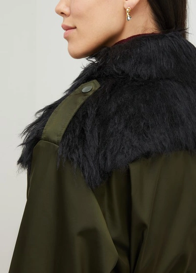 Shop Prada Long Coat With Fake Fur In Military/black