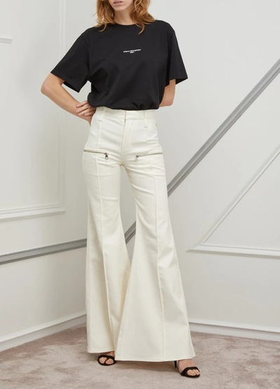 Shop Chloé Flare Jeans In Dusty White