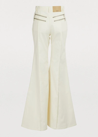 Shop Chloé Flare Jeans In Dusty White