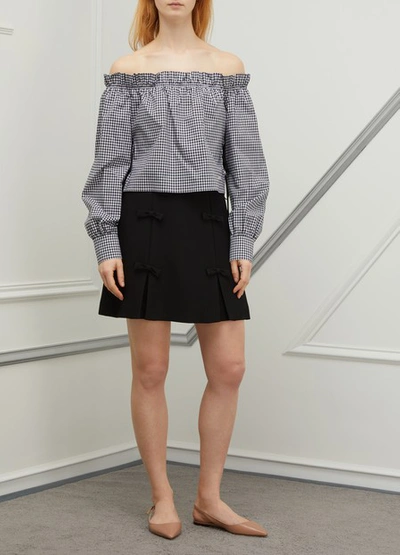 Shop Miu Miu Bow Mini Skirt In Black