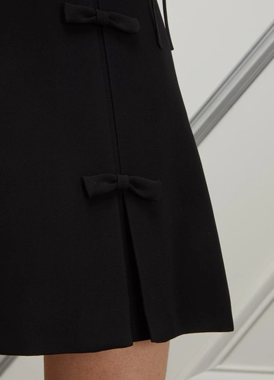 Shop Miu Miu Bow Mini Skirt In Black