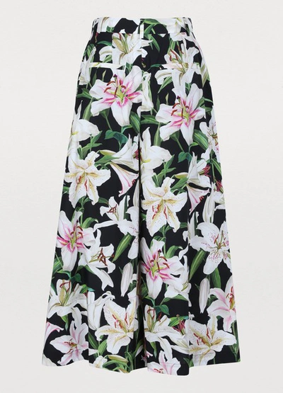 Shop Dolce & Gabbana Floral Print Trousers In Black