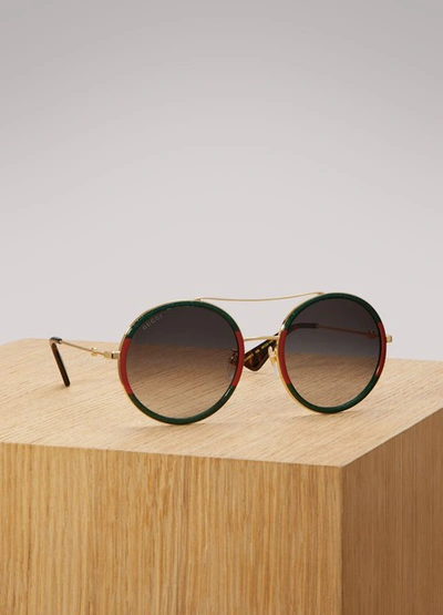 Shop Gucci Round-frame Sunglasses In Métal Doré/vert