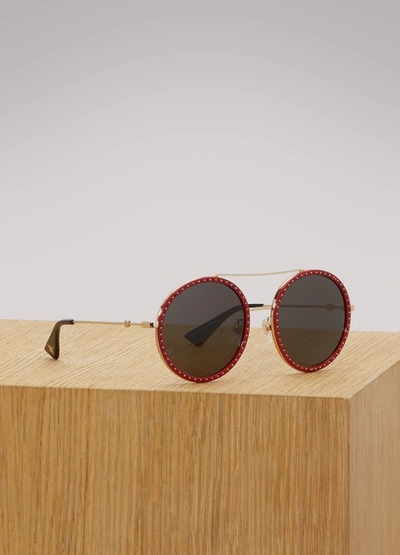 Shop Gucci Round-frame Sunglasses In Gold/grey/red