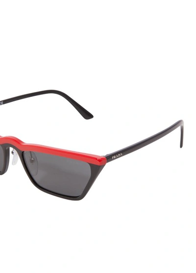 Shop Prada Ultravox Sunglasses In Black /red