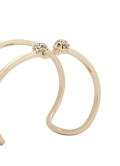 Shop Alexander Mcqueen Skull Bracelet In 7285 - 0953+cr.met/l.gold