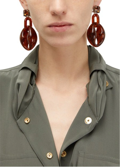 Shop Prada Earrings In Bruciato Tartaruga