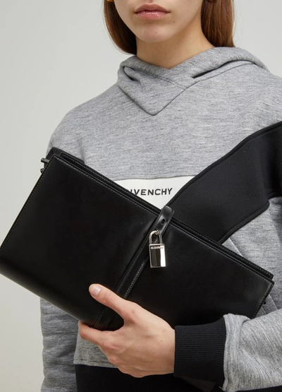 Shop Jil Sander Padlock Clutch Bag In 001-black