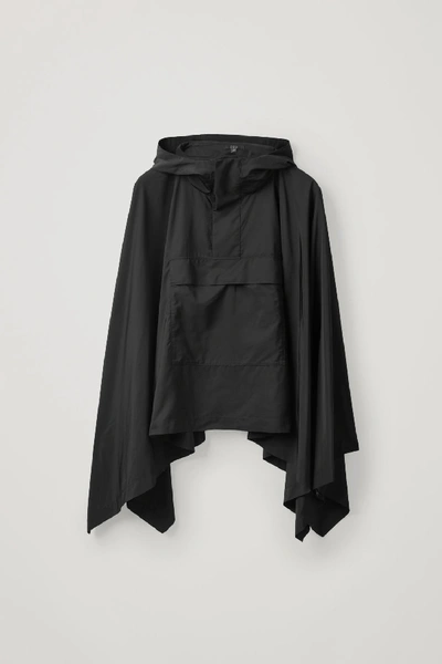 Shop Cos Hooded Rain Poncho In Black