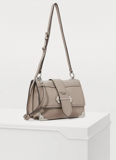 Shop Prada Cahier Crossbody Bag In Pomice/astrale 1