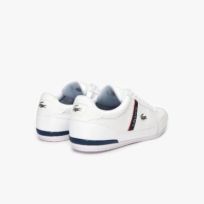 Shop Lacoste Men's Chaymon Sneaker In White / Navy