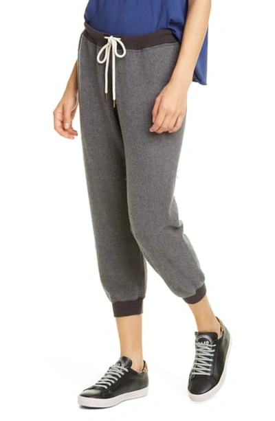 Shop The Great The Cropped Sweatpants In Washed Black