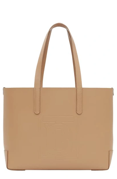 Shop Burberry Embossed Monogram Leather Tote In Camel