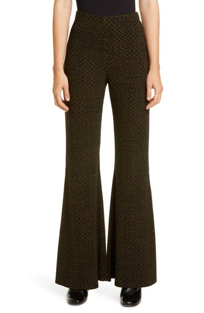 Shop Beaufille Riva Tiled Chevron Knit Flare Pants In Green And Black