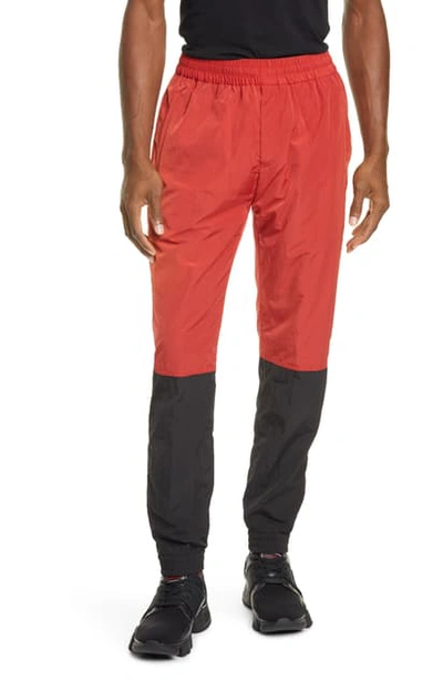 Shop Givenchy Colorblock Nylon Track Pants In Red