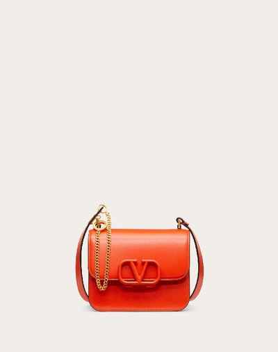 Shop Valentino Garavani Small Vsling Shiny Calfskin Shoulder Bag In Orange