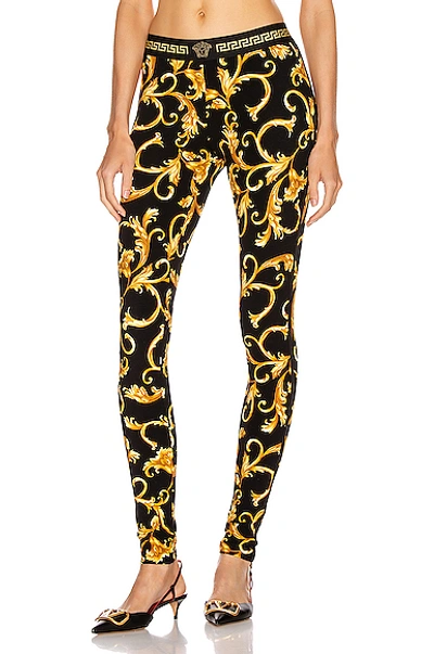 Shop Versace Print Legging In Black & Gold