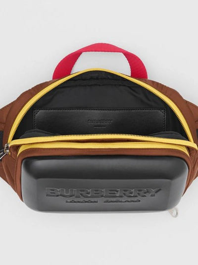 Shop Burberry Logo Embossed Panel Nylon Bum Bag In Black