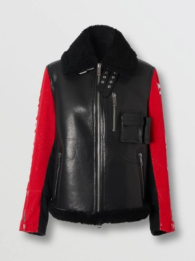 Shop Burberry Contrast Sleeve Leather And Shearling Jacket In Black