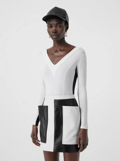 Shop Burberry Two-tone Stretch Jersey Bodysuit In Optic White
