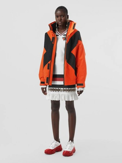 Shop Burberry Panelled Nylon Track Jacket With Detachable Warmer In Bright Orange