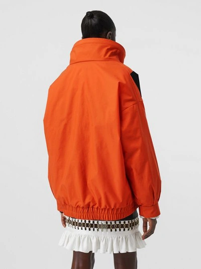 Shop Burberry Panelled Nylon Track Jacket With Detachable Warmer In Bright Orange