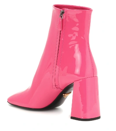 Shop Prada Patent Leather Ankle Boots In Pink