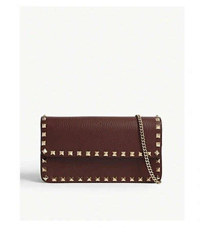 Shop Valentino Rockstud Leather Cross-body Bag In Rubin