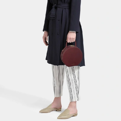 Shop Mansur Gavriel Circle Crossbody Bag In Burgundy Vegetable Tanned Leather