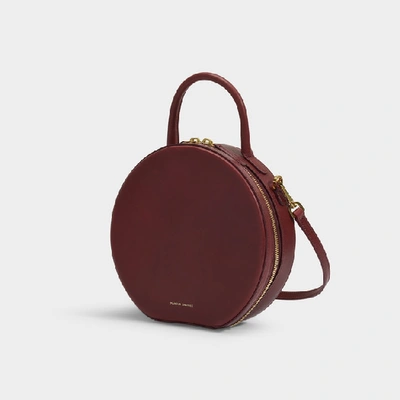 Shop Mansur Gavriel Circle Crossbody Bag In Burgundy Vegetable Tanned Leather