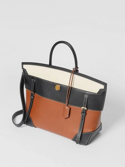 Shop Burberry Tri-tone Leather And Canvas Society Top Handle Bag In Tan/black