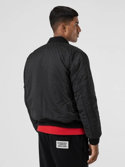 Shop Burberry Reversible Monogram Econyl® Jacquard Bomber Jacket In Black