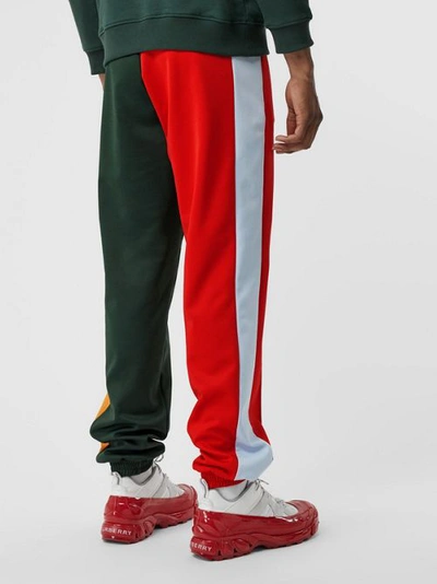 Shop Burberry Logo Graphic Colour Block Jersey Trackpants In Dark Pine Green