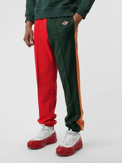 Shop Burberry Logo Graphic Colour Block Jersey Trackpants In Dark Pine Green