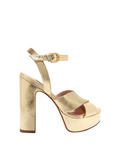 Shop Stuart Weitzman Sandals In Gold