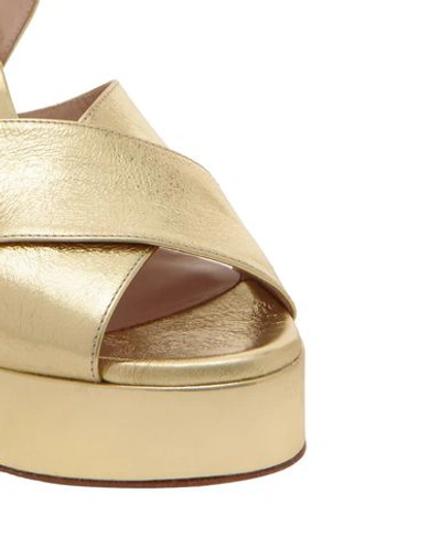 Shop Stuart Weitzman Sandals In Gold