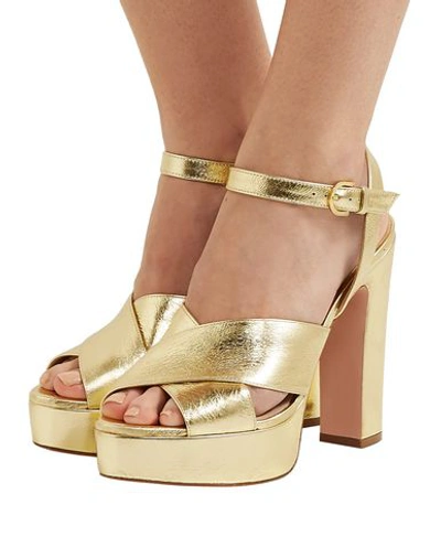 Shop Stuart Weitzman Sandals In Gold