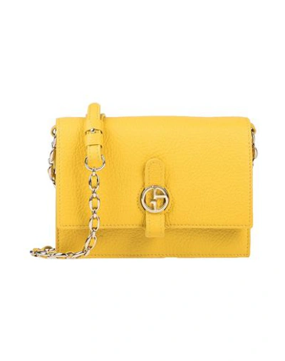 Shop Giorgio Armani Handbags In Yellow