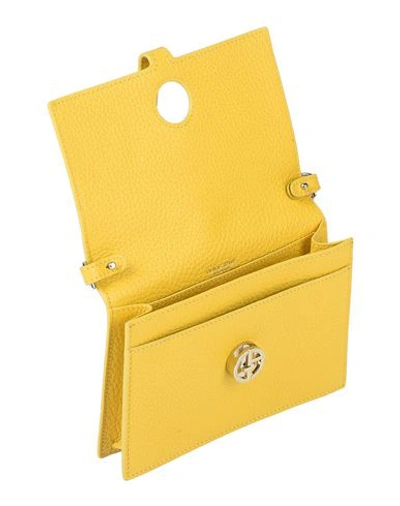 Shop Giorgio Armani Handbags In Yellow