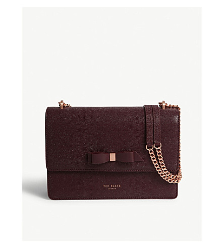 joanaa bow detail leather cross body bag