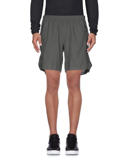 Shop Adidas X Undefeated Shorts & Bermuda In Lead