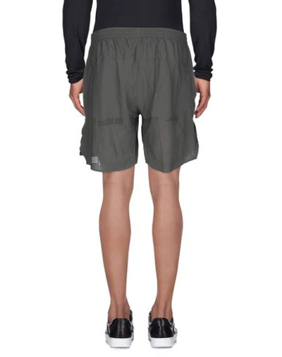 Shop Adidas X Undefeated Shorts & Bermuda In Lead