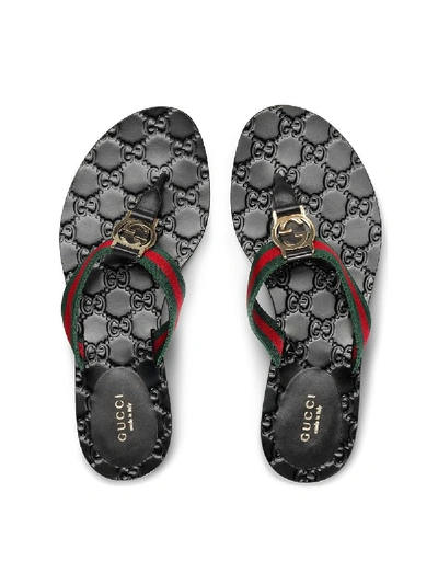 Shop Gucci Leather Thongs With Gg Web In Black