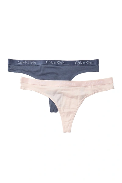Shop Calvin Klein Solid Thong - Pack Of 2 In Hrf Sd/rswtr