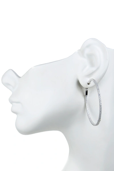 Shop Cz By Kenneth Jay Lane Cz Inside-out 50mm Hoop Earrings In Clear-silver