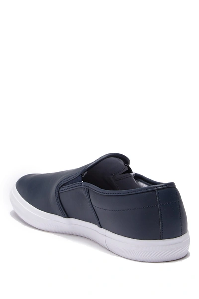 Shop Lacoste Tatalya Leather Slip-on Sneaker In Navy/white