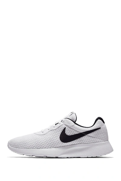 Shop Nike Tanjun Sneaker In 101 White/black